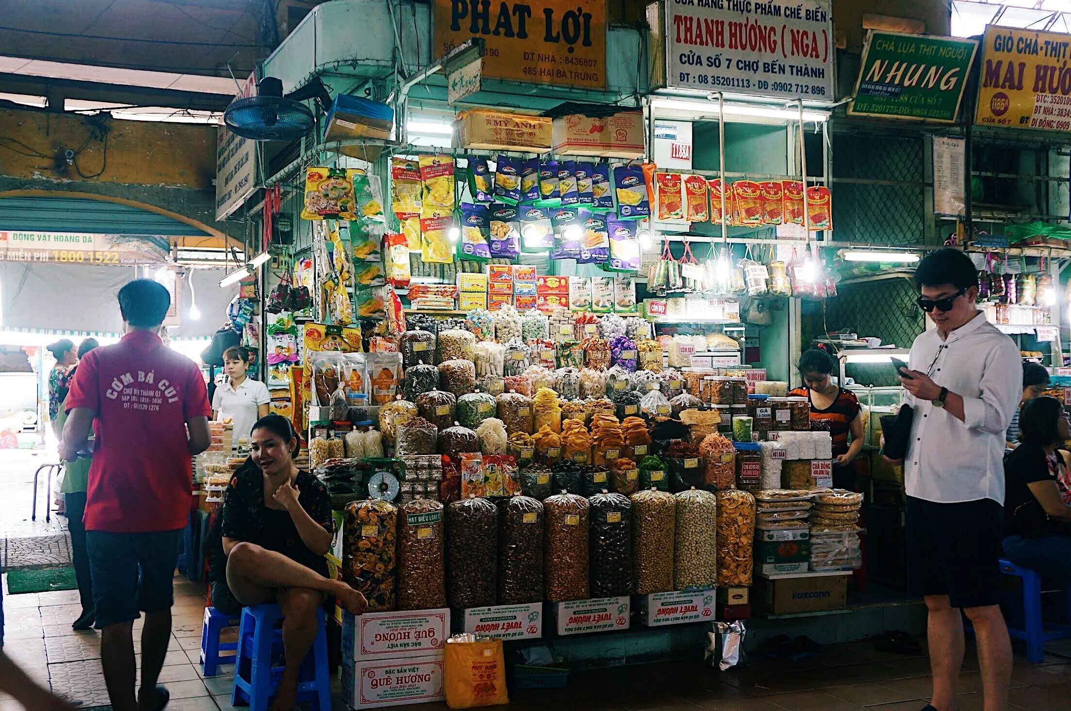 Photograph the vibrant evening at Ben Thanh Market